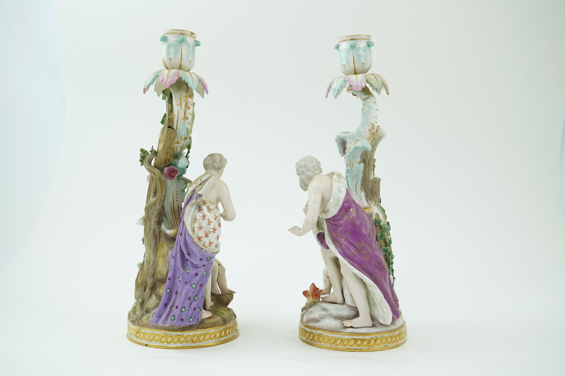 A near pair of Meissen figural candlesticks, late 19th century